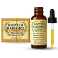 Gurunanda Rooted Radiance Ayurvedic Belly Button Oil front view of bottle and box