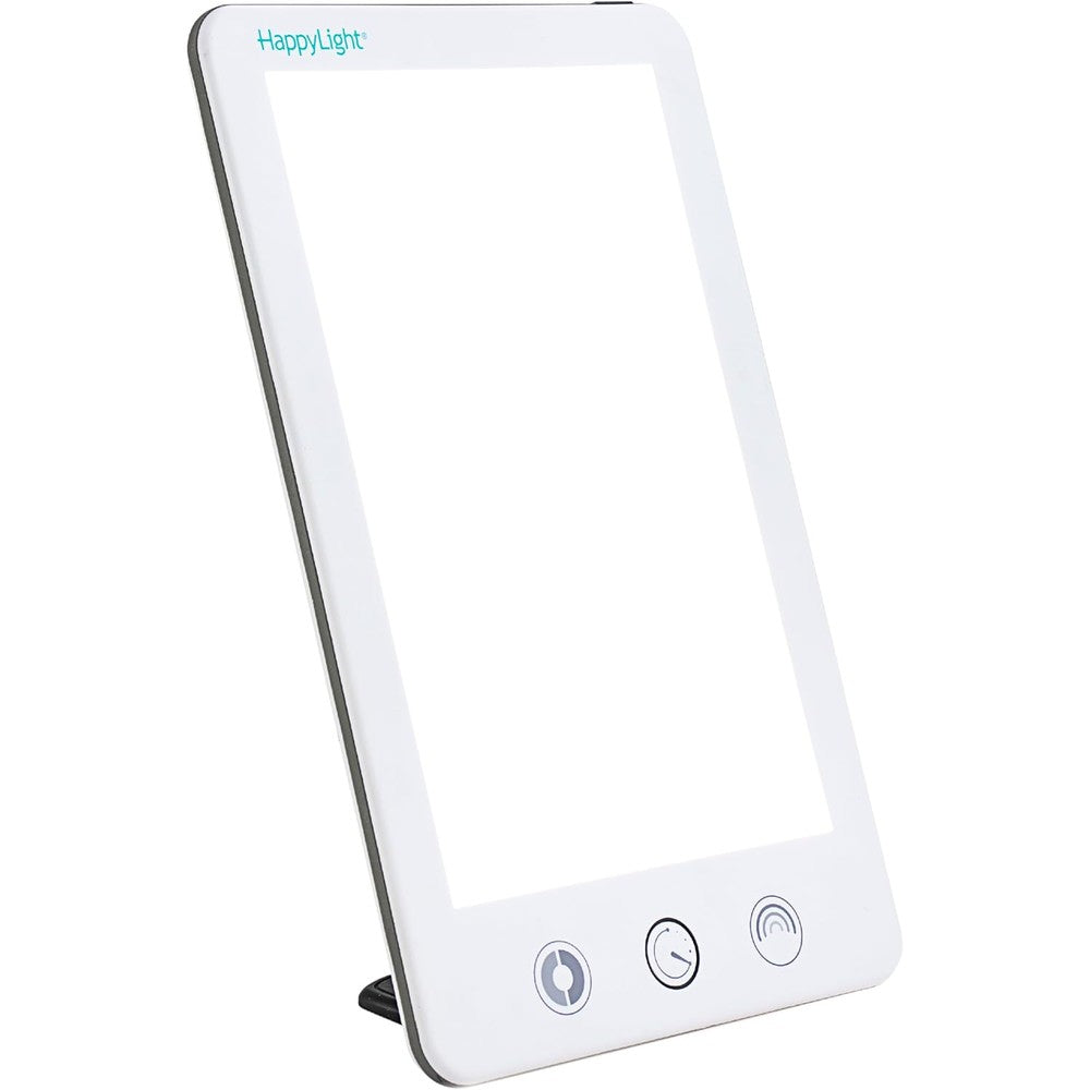 Verilux HappyLight Touch Plus light therapy lamp front view on a desk setup