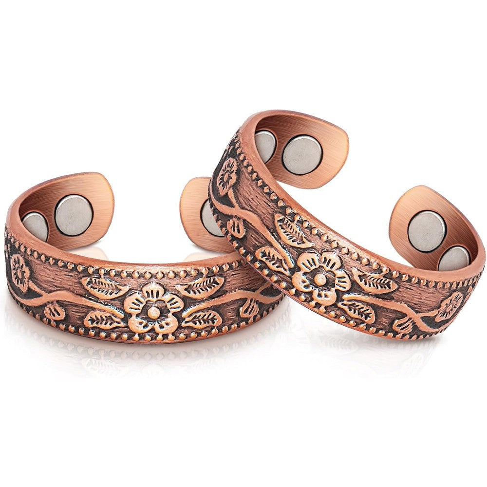 Auramag copper magnetic rings front view showing vintage flower pattern