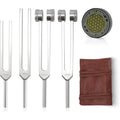 Mllusxg tuning forks for healing set laid out with red leather pouch and rubber mallet activator