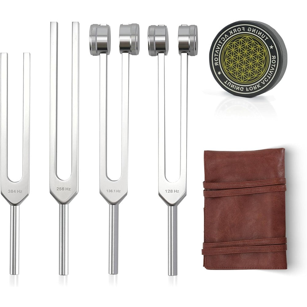 Mllusxg tuning forks for healing set laid out with red leather pouch and rubber mallet activator