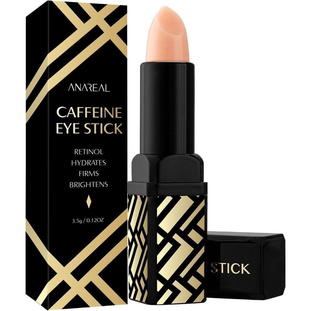 ANAREAL Caffeine Under Eye Balm Stick front view of black container with gold geometric pattern