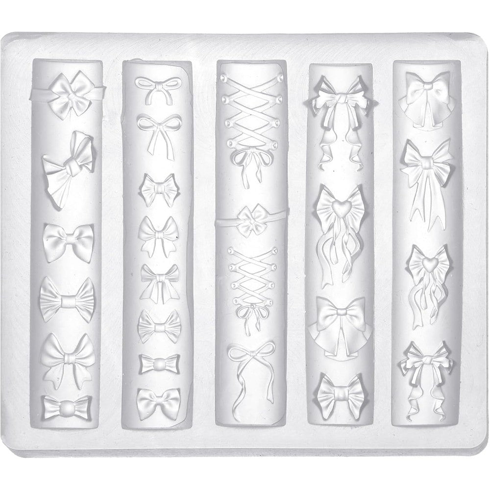 Lasuroa bow nail charm mold front view showing multiple transparent 3D bow design cavities.