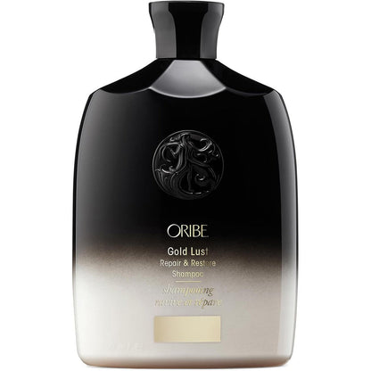 Oribe Gold Lust Repair And Restore Shampoo front view bottle showing premium gradient design for damaged hair care.