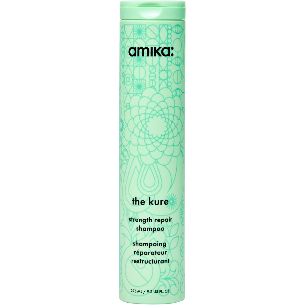Amika The Kure Strength Repair Shampoo front view of light green bottle for damaged hair care.