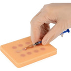 Ultrassist Intradermal Injection Training Pad front view showing practice spots.