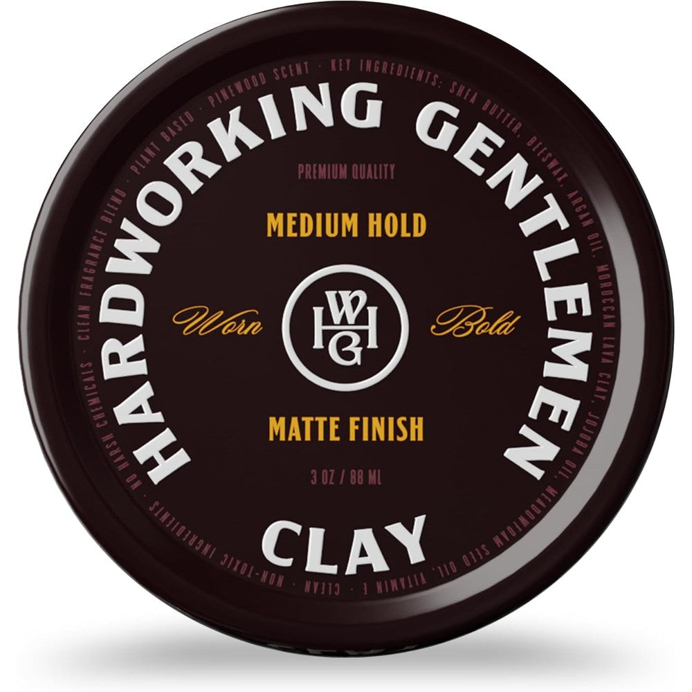 Hardworking Gentlemen medium hold hair clay front view container on plain background