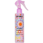 Amika Brooklyn Bombshell Blowout Volume Spray front view showing the colorful floral bottle design