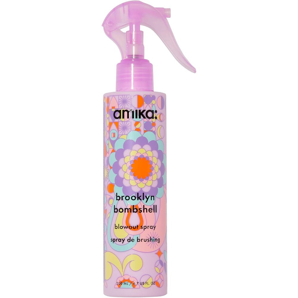 Amika Brooklyn Bombshell Blowout Volume Spray front view showing the colorful floral bottle design
