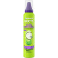Garnier Fructis Style Curl Construct Creation Mousse front view showcasing bright green bottle with purple cap for curly hair styling.