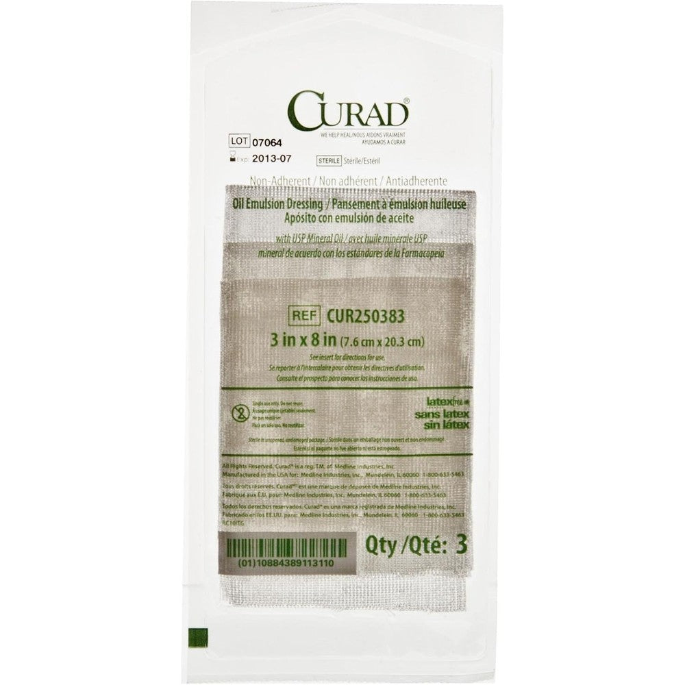 Curad Sterile Non Adherent Oil Emulsion Gauze Dressing front view pack of three for advanced first aid wound care.
