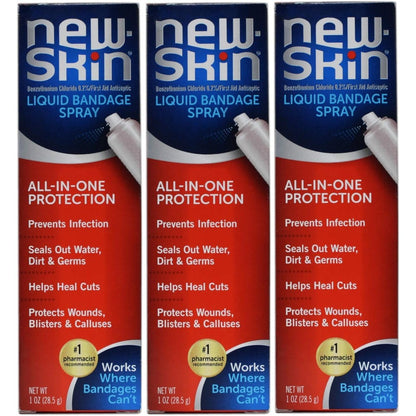New-Skin Liquid Bandage Spray front view pack of three canisters for first aid wound protection.