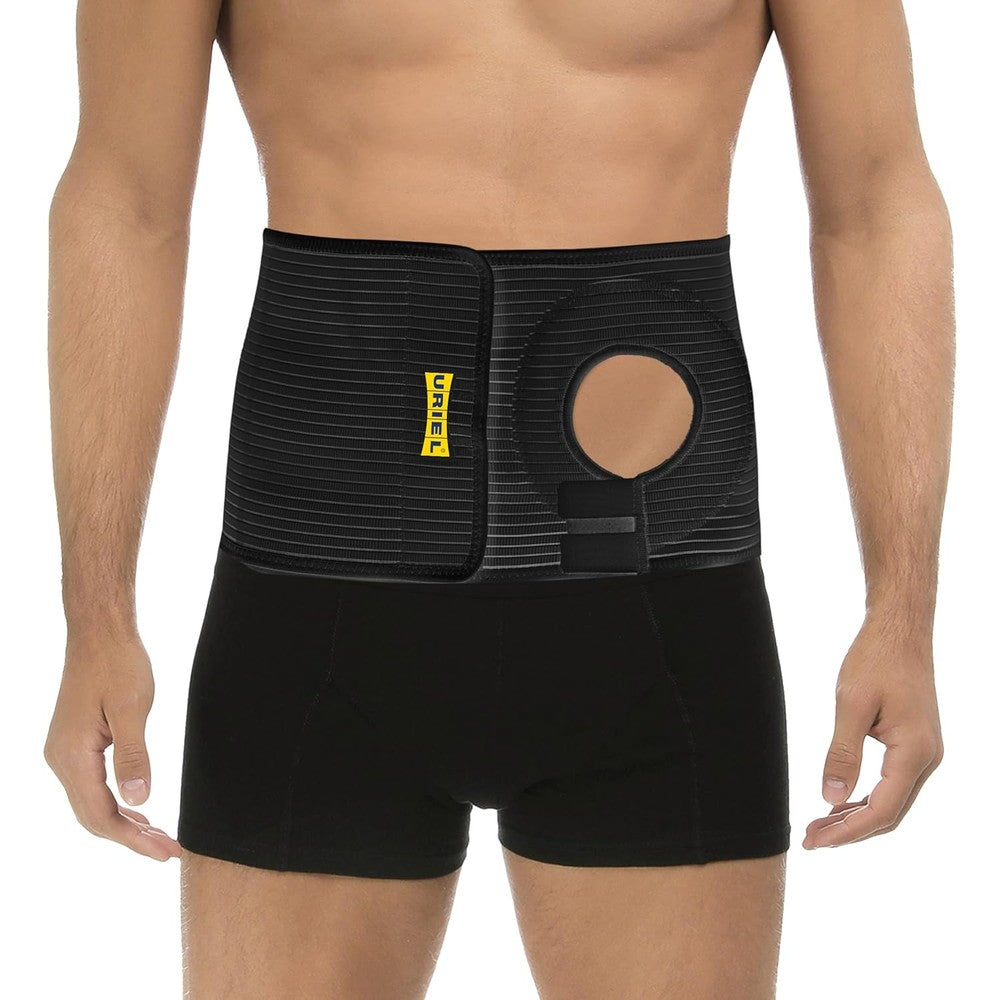 URIEL Abdominal Ostomy Belt front view showcasing the circular stoma opening on black support fabric.