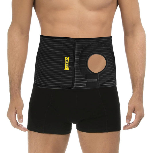 URIEL Abdominal Ostomy Belt front view showcasing the circular stoma opening on black support fabric.