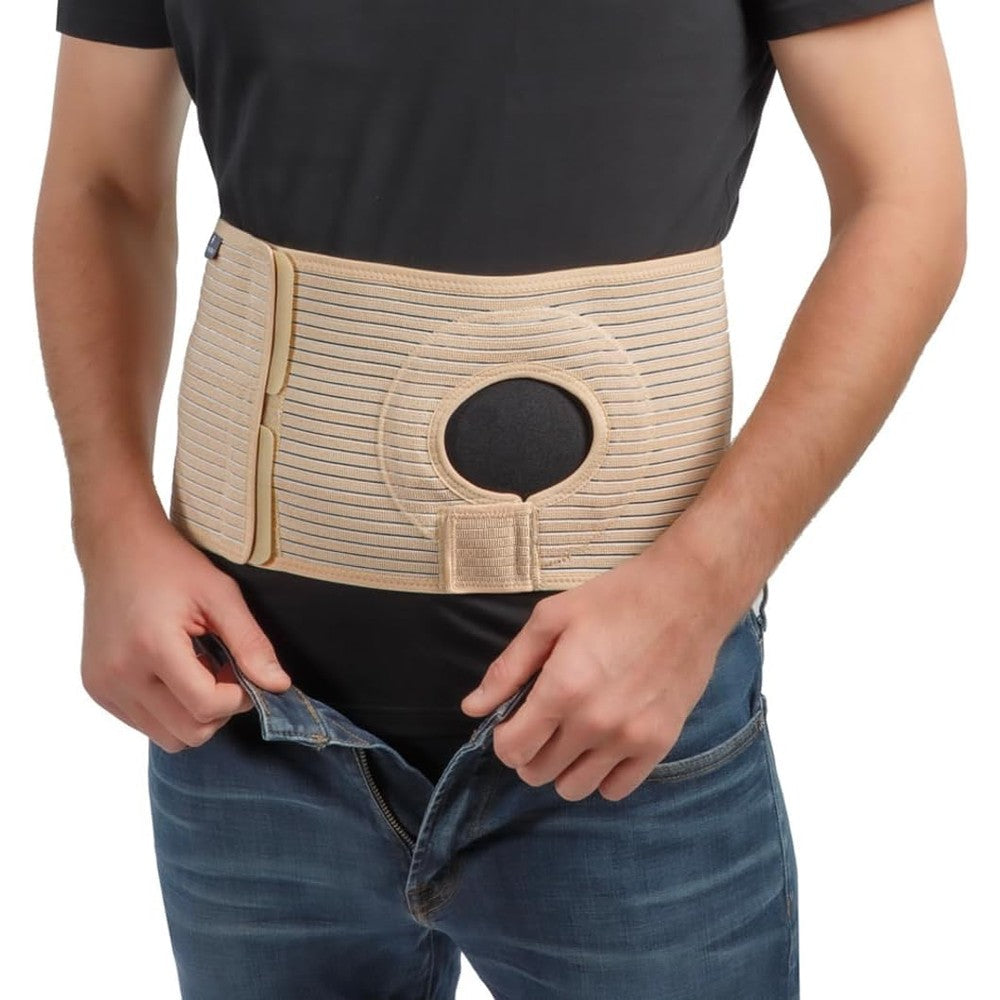 Movibrace abdominal ostomy belt front view showing beige medical grade ribbed fabric and adjustable stoma ring opening.