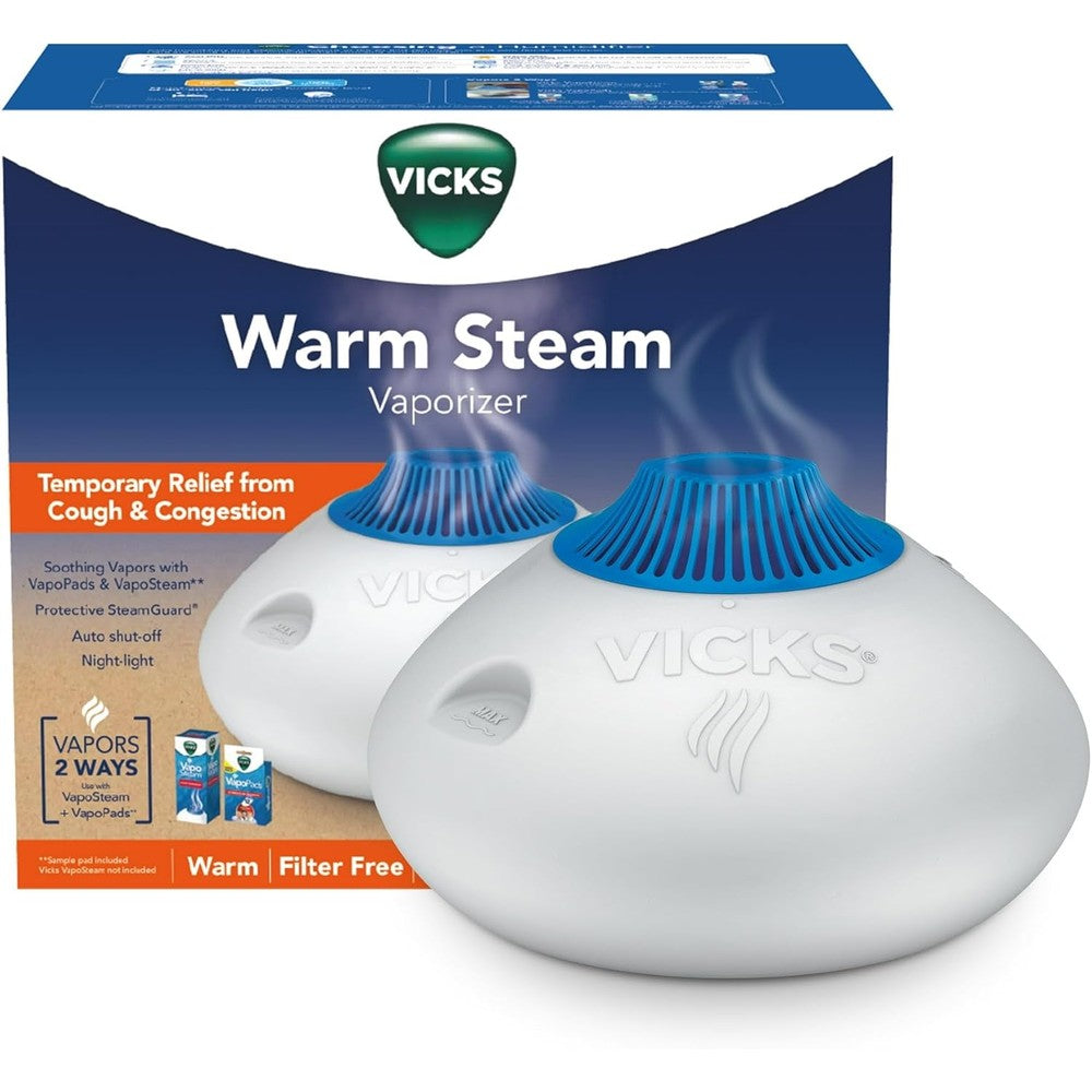 Vicks Warm Steam Vaporizer front view showing the 1.5 gallon translucent blue tank and steam head