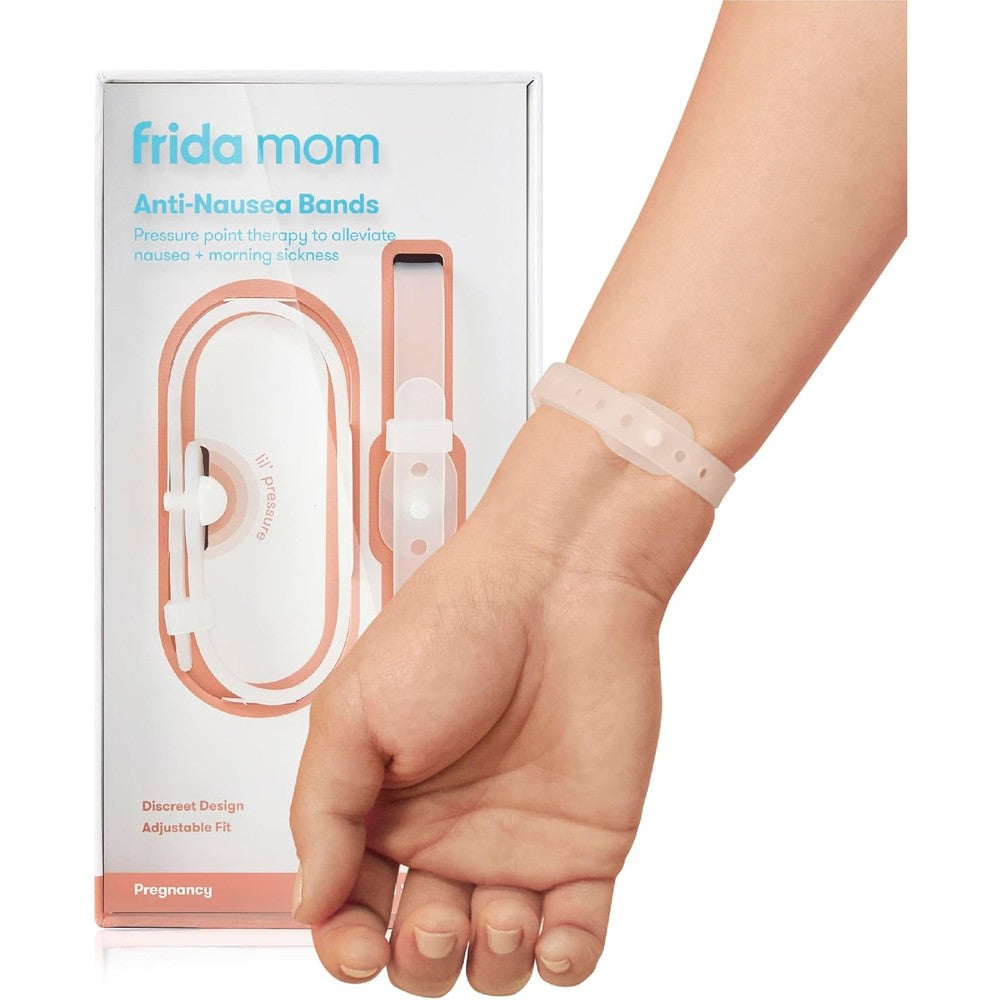 Frida Mom Nausea Bands front view of the packaging and two peach-colored wristbands.