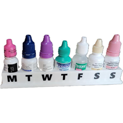 Znet3D Eye Drop Bottle Holder and Weekly Organizer front view showing 7 day labeled tray storage stand.