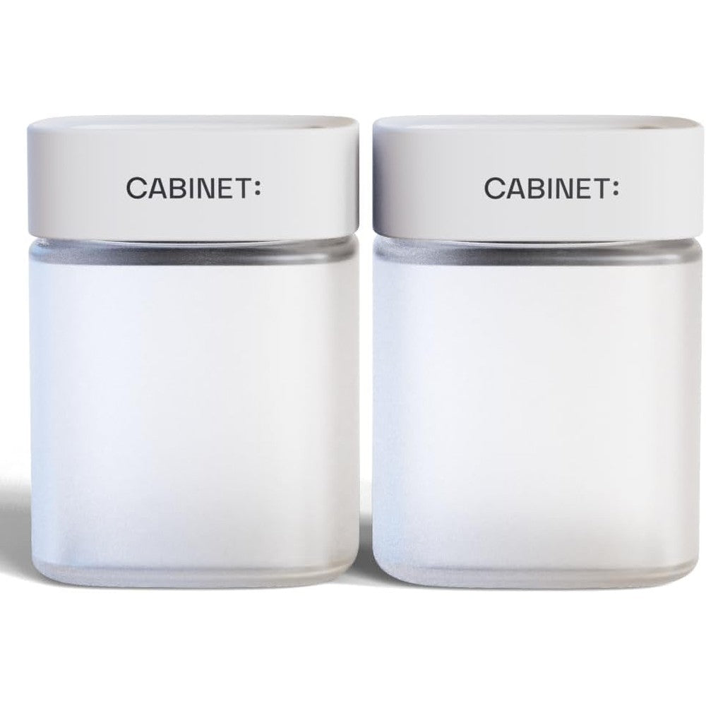 Cabinet reusable glass medicine bottles front view with white childproof rx caps