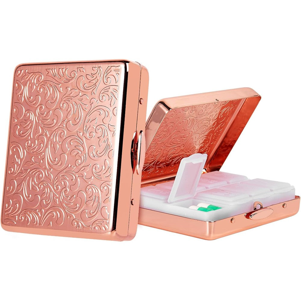 EYIWEITING travel metal pill organizer pink front view showing secure outer shell closure