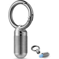 TISUR titanium keychain pill holder front view showcasing the premium metallic finish and compact design.
