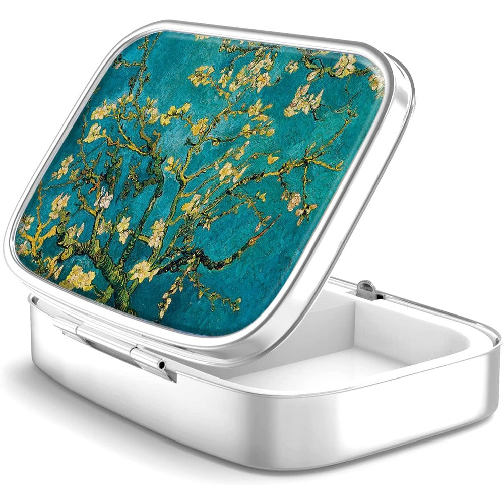 Hion metal pill box 2 compartment front view showing Van Gogh Almond Blossom art design