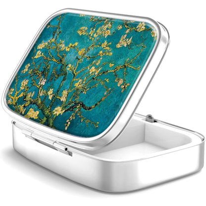 Hion metal pill box 2 compartment front view showing Van Gogh Almond Blossom art design