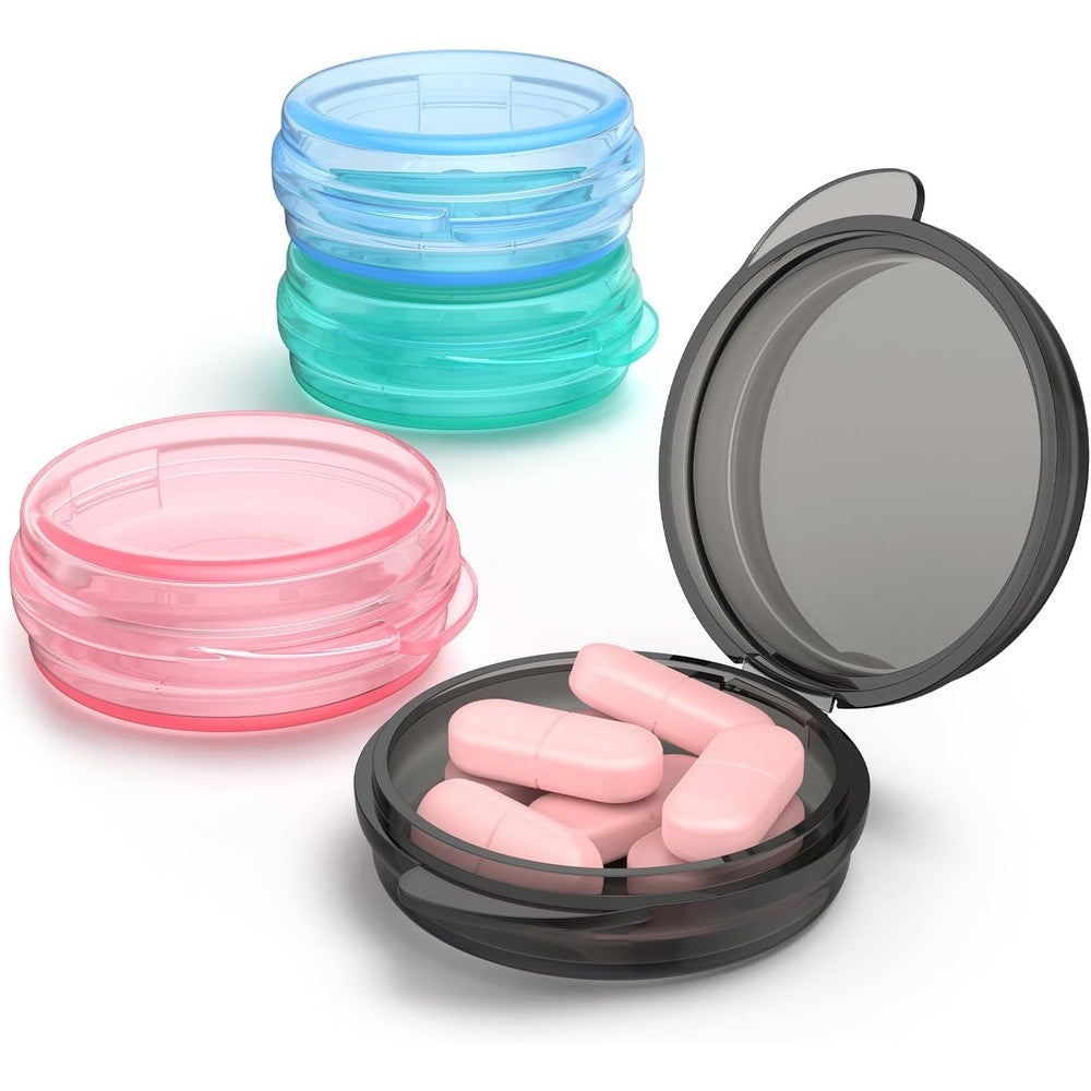 Urekt small pill box front view showing four multi colored portable daily medicine containers.