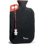 Peterpan rubber hot water bottle front view with black knitted cover and red handle