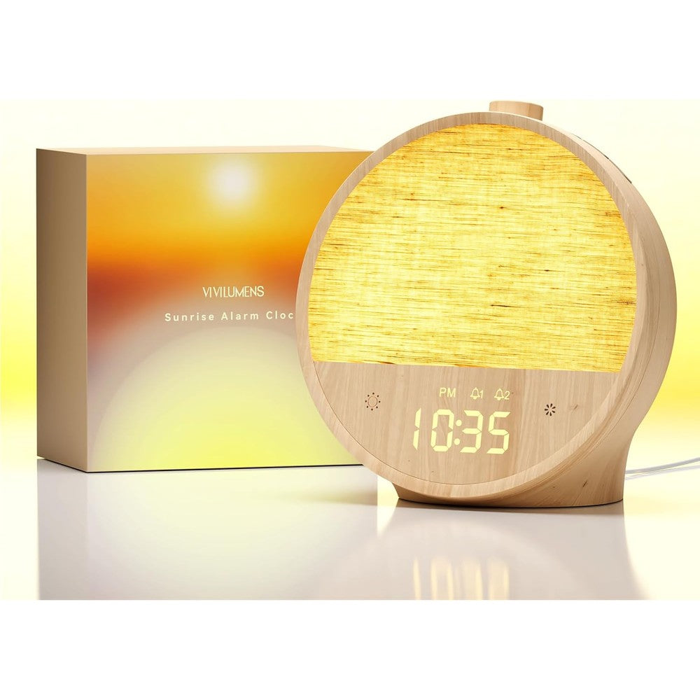 Vivilumens Wood Grain Sunrise Alarm Clock front view displaying glowing digital time and warm white light on a bedside table.