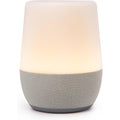 Yogasleep Duet White Noise Machine front view with amber night light glow