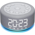 Hushing sound machine alarm clock front view displaying the digital time screen and top control buttons.