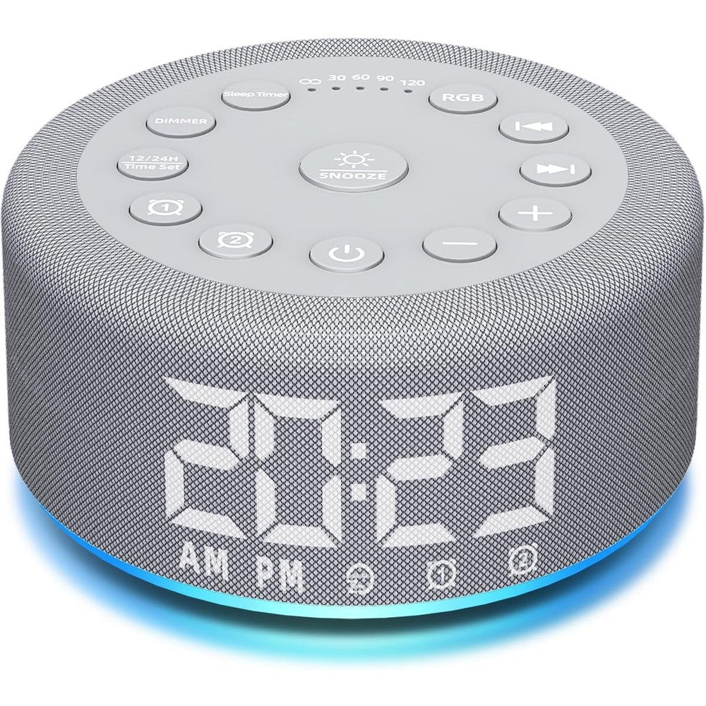 Hushing sound machine alarm clock front view displaying the digital time screen and top control buttons.