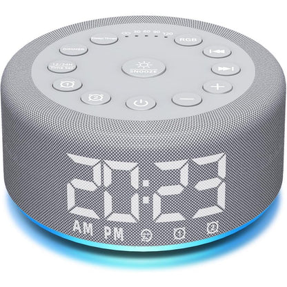 Hushing sound machine alarm clock front view displaying the digital time screen and top control buttons.
