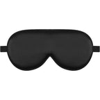Alaska Bear Natural Silk Sleep Mask front view in black showing contoured padding.