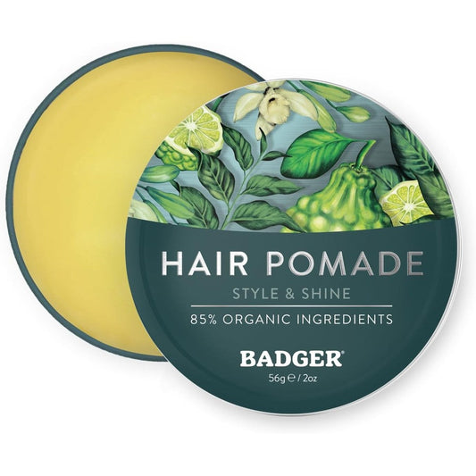 Badger Man Care Hair Pomade two ounce tin front view showing certified organic grooming packaging.