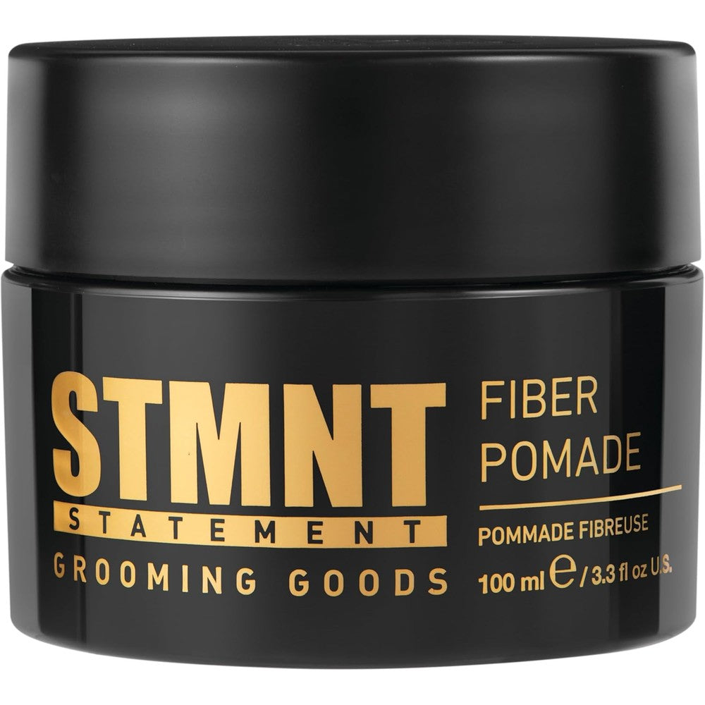 STMNT Grooming Goods Fiber Pomade front view jar showcasing strong control hair product packaging
