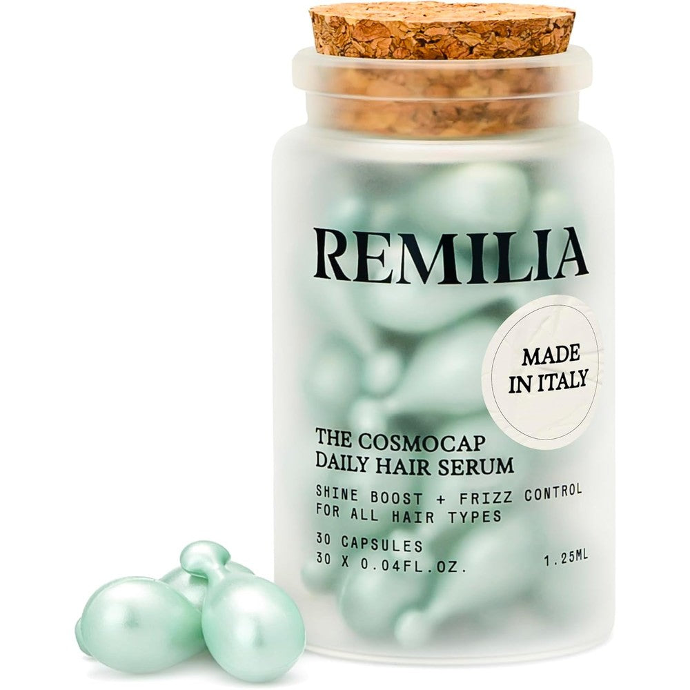 Remilia Hair Cosmocap Keratin Hair Capsules front view of the frosted glass bottle showcasing the 30 softgel capsules.