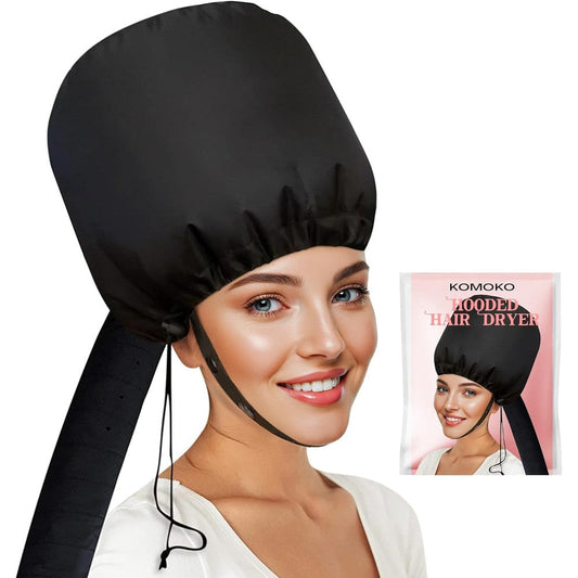 Komoko Hooded Hair Dryer black bonnet attachment connected to a blow dryer for hands-free hair conditioning.