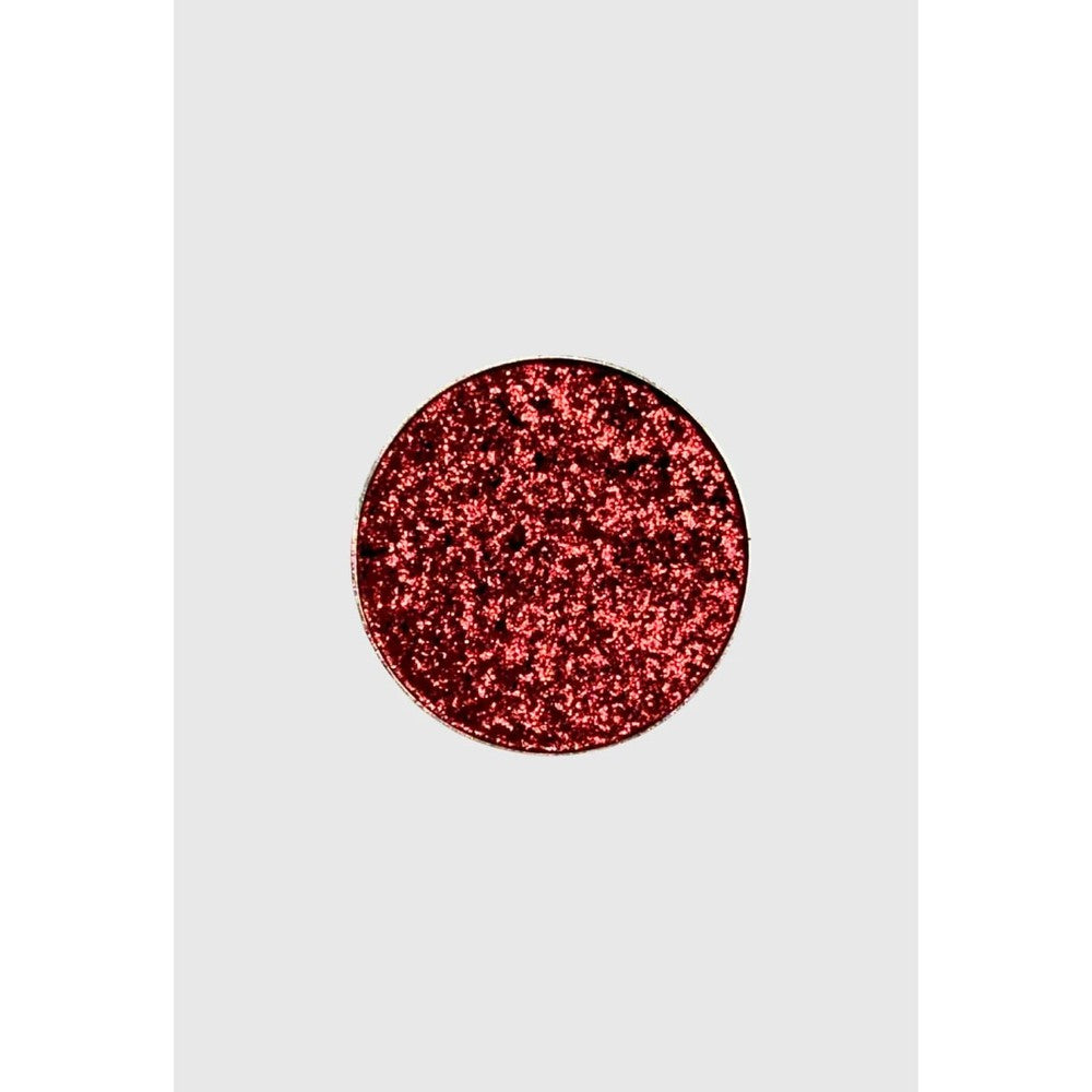 Nekoyanin Pressed Pigments Steel Heart single eyeshadow pan front view featuring black base and red glitter.