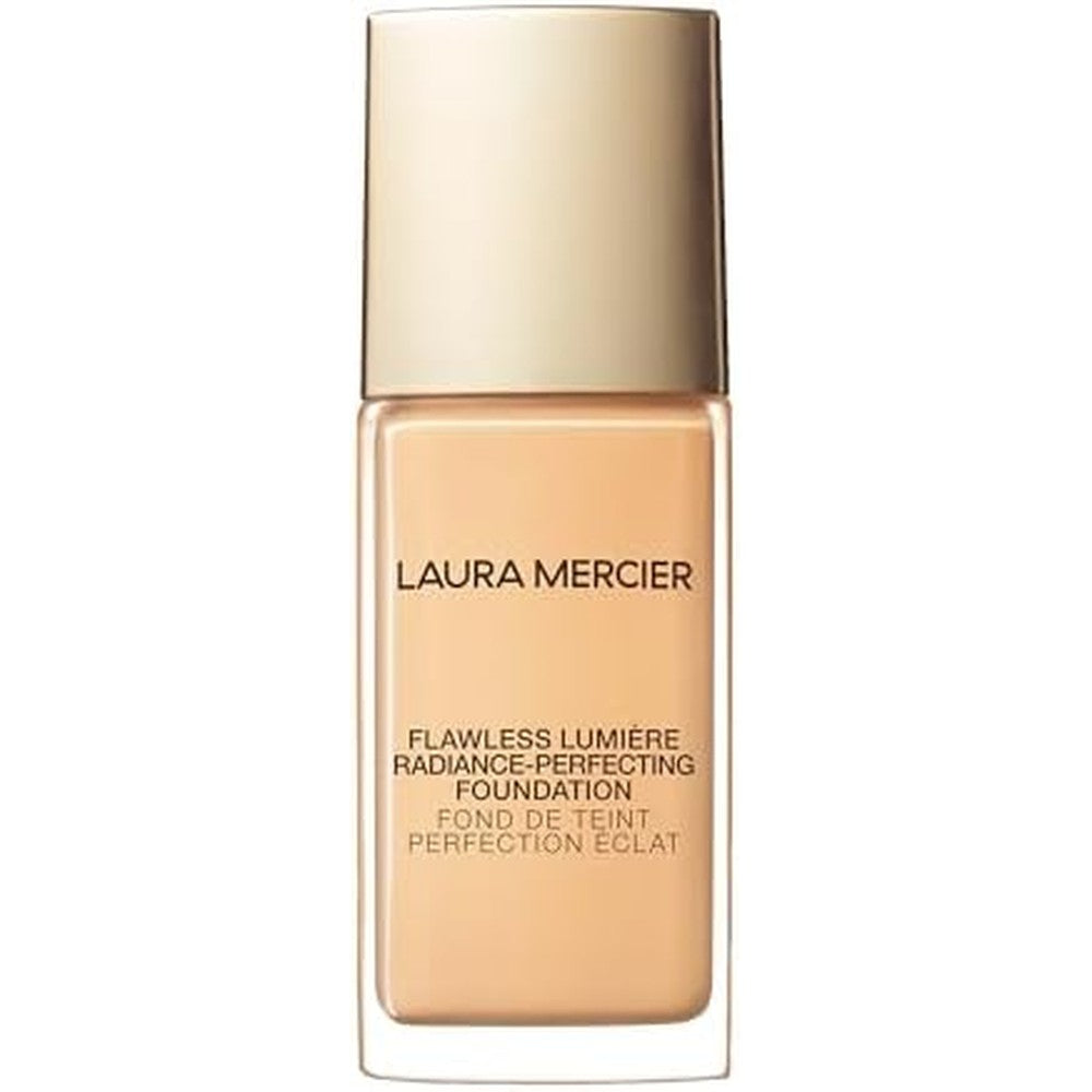 Laura Mercier Flawless Lumiere Foundation front view showing the elegant glass bottle and pump packaging.