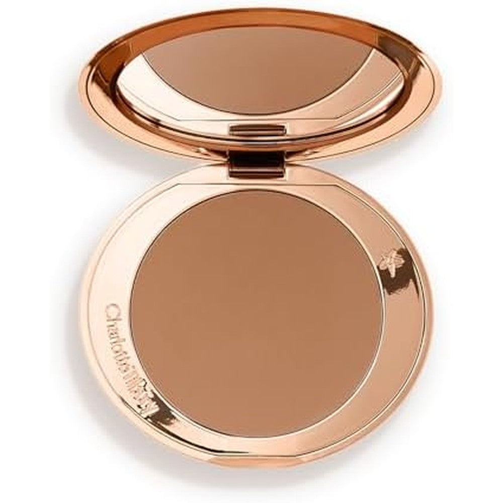 Charlotte Tilbury Airbrush Matte Bronzer front view showing the luxurious gold star engraved compact