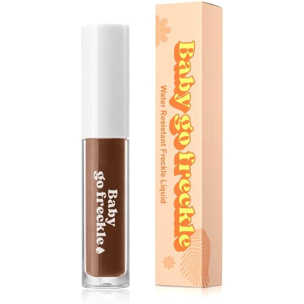 Baby Go Dewy Water Resistant Faux Freckle Liquid Pen Stamp front packaging view showing the light orange box.