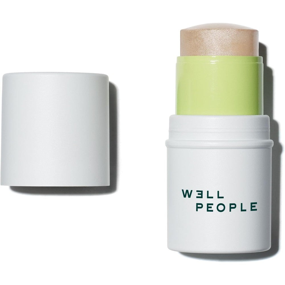 Well People Supernatural Stick Highlighter Universal Glow front view cream makeup stick
