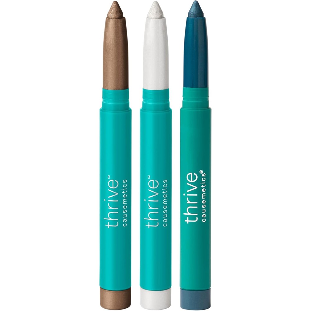 Thrive Causemetics Brilliant Eye Brightener Bundle for Brown Eyes front view showcasing three shadow sticks and confetti makeup bag.