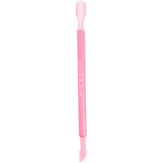 Olive And June Manicure Cuticle Pusher front view showing the pink dual ended design and rubberized grip