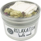 Rooted Earth relaxation herbal bath soak front view of 8 fluid ounce tin with muslin bag