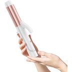 Mooqlizz dual voltage curling iron front view showing white handle and rose gold ceramic plates
