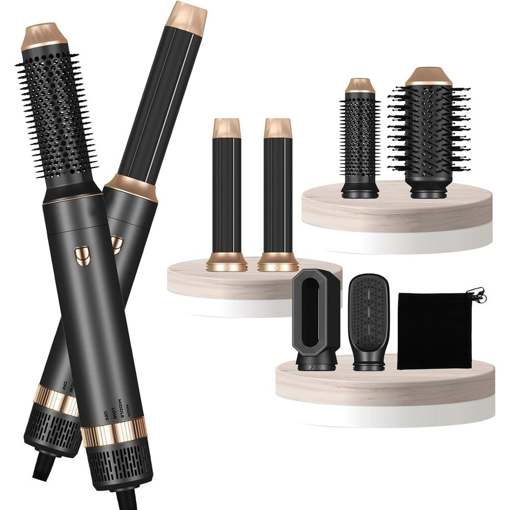 Yitrust 6 in 1 hair dryer brush front view showing the sleek black main handle and detachable blow dryer nozzle.