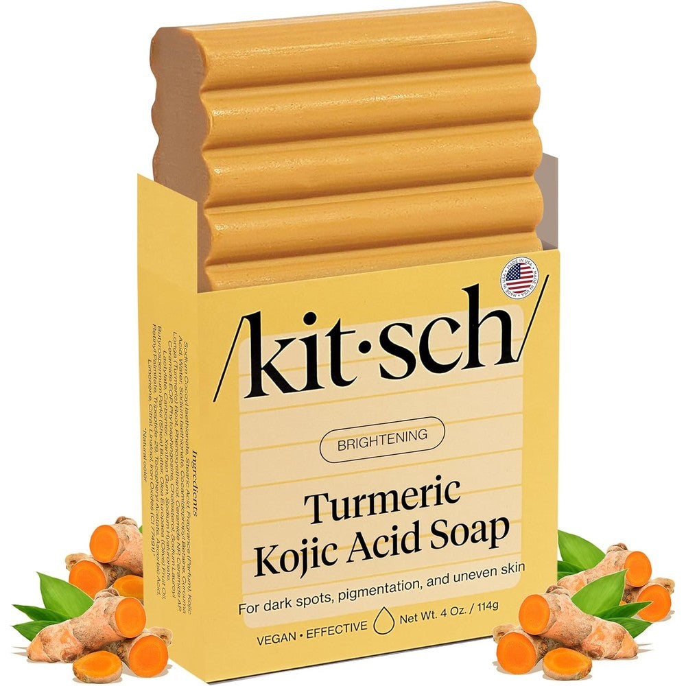 Kitsch Kojic Acid Soap front view of the packaging and four ounce turmeric bar